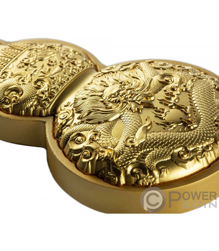 Moneda china color plata con dragón y símbolos de la suerte